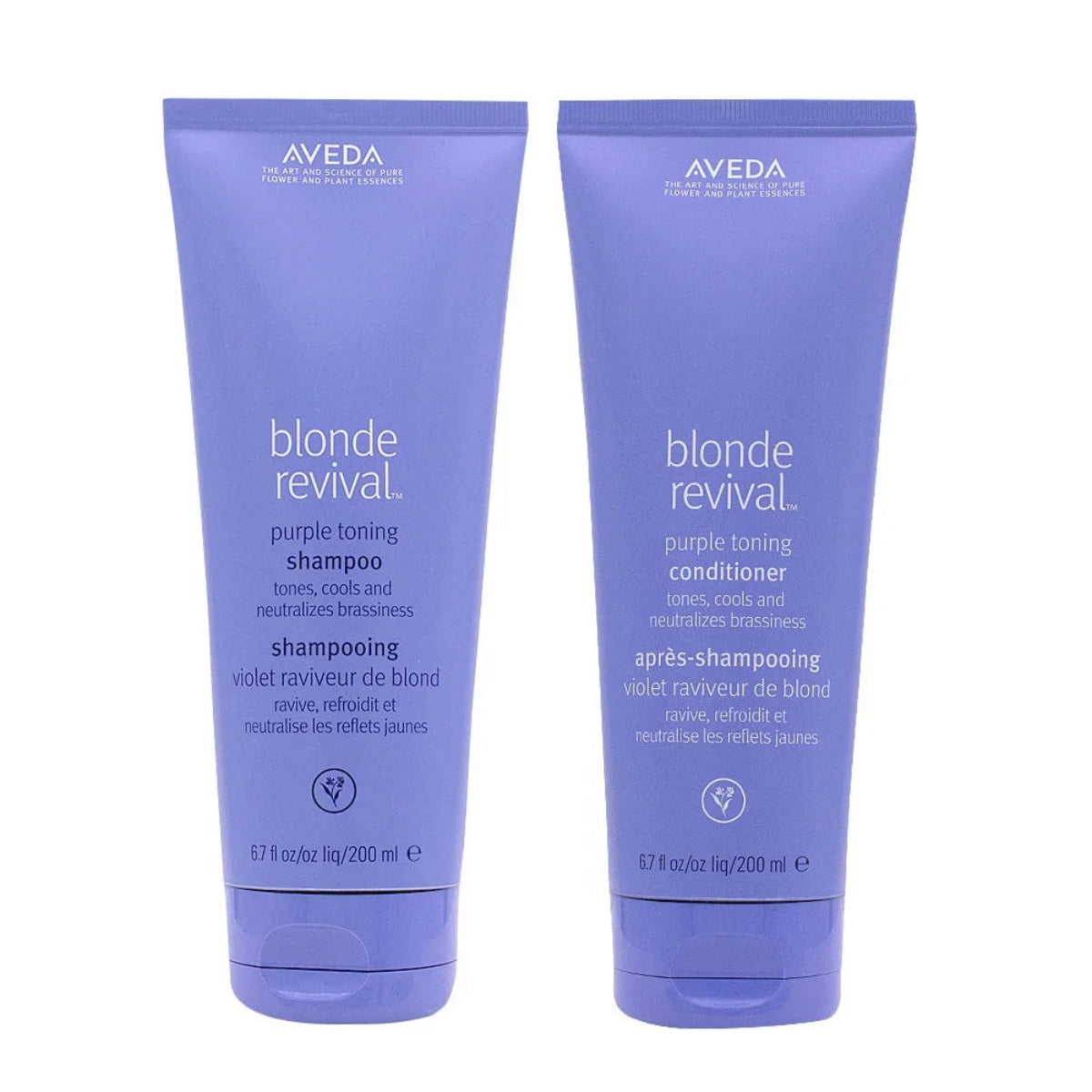 Two Aveda blonde revival purple toning shampoo and conditioner bottles on a white background