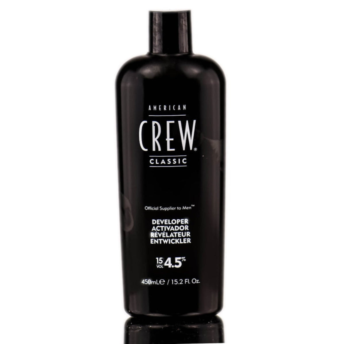 A bottle of American Crew Developer 15 Volume 4.5% in a black container with white and red label, 15.2 oz in size.