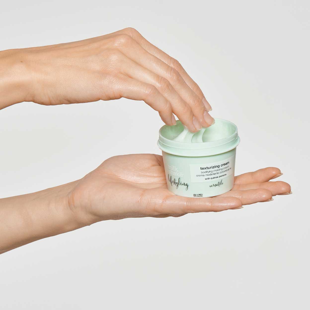 milk-shake-texturizing-cream-in-hand-2_1296x_c75e76d7-77c2-4f68-9f14-01c0720ed73f.jpg